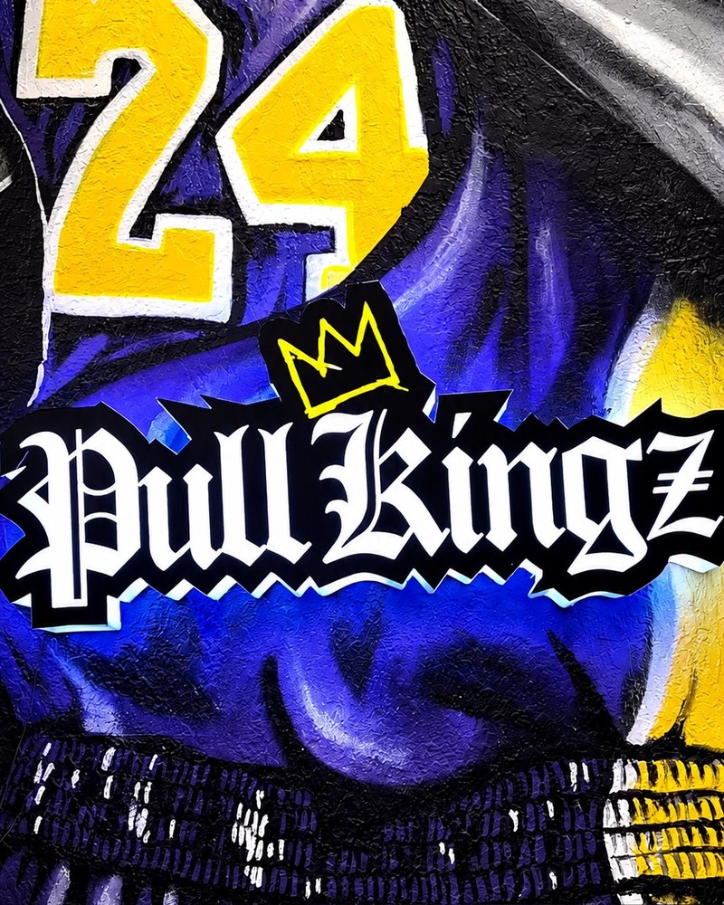 Pull Kingz Hobby shop — Pull Kingz logo on the Kobe mural